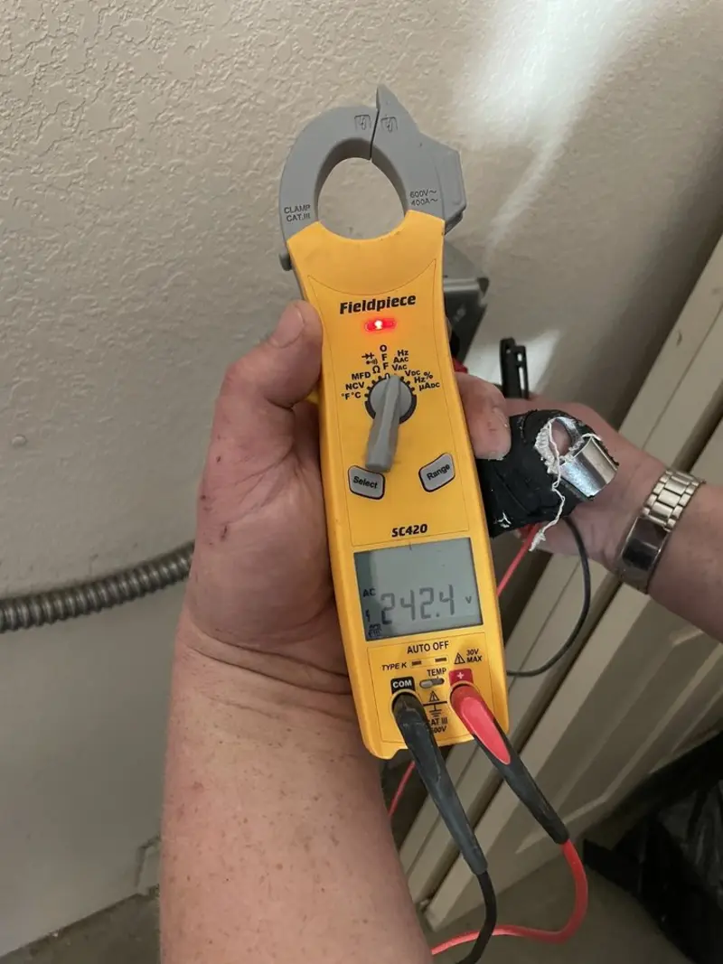 Voltage testing with clamp meter during Generator Installation in Baker City